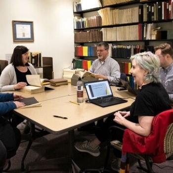 Staff from the USU Libraries meet with representatives of the U.S. Government Printing Office.